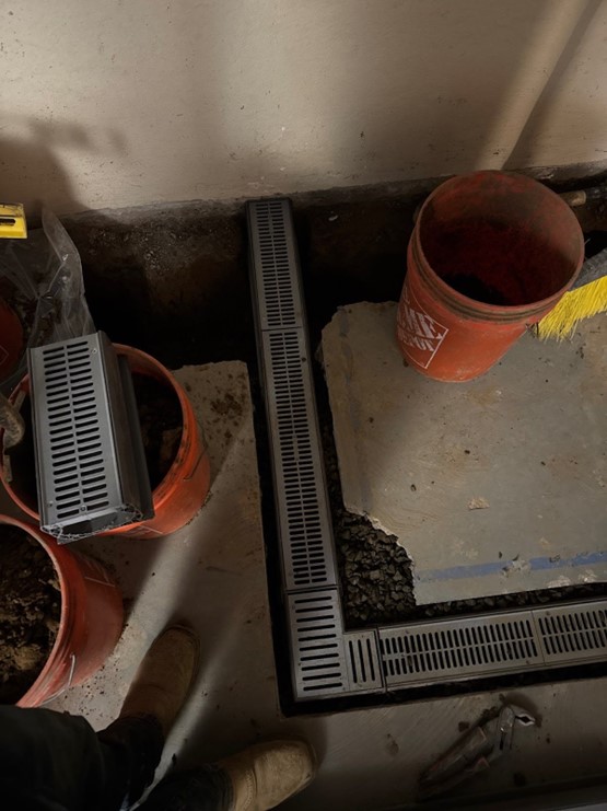 Pool drain with trenches