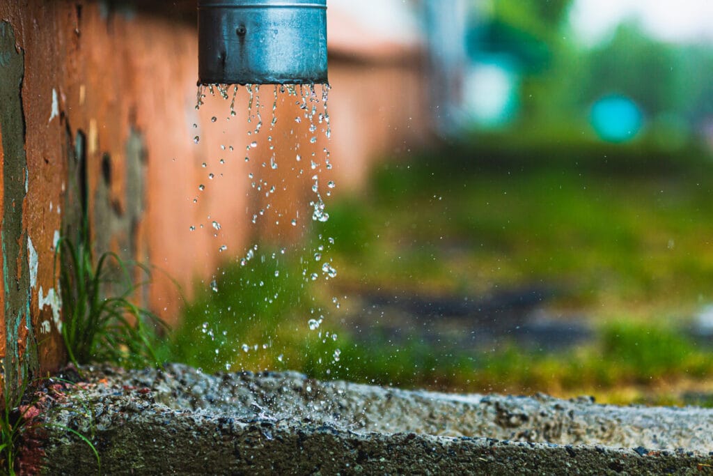 Rain water coming down gutter