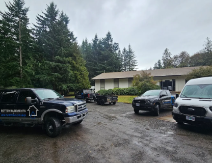 Better basements trucks outside of house