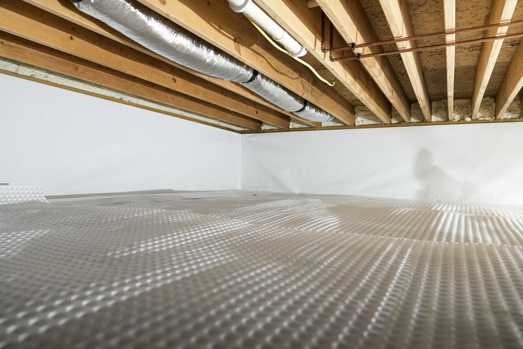 completed crawl space encapsulation with white vapor barrier installed by Better Basement and Waterproofing Portland Oregon