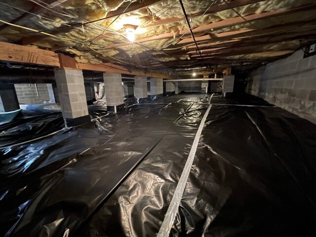 professional crawl space vapor barrier installation in Portland Oregon home by Better Basement and Waterproofing
