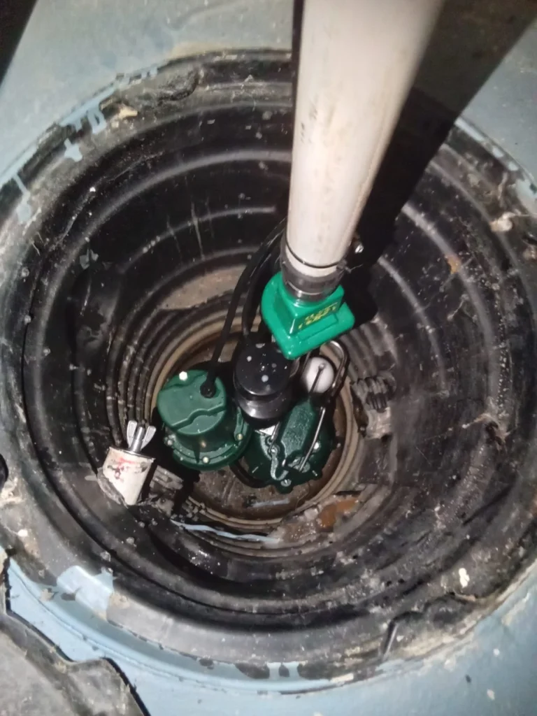 professional sump pump installation in Portland Oregon basement by Better Basement and Waterproofing