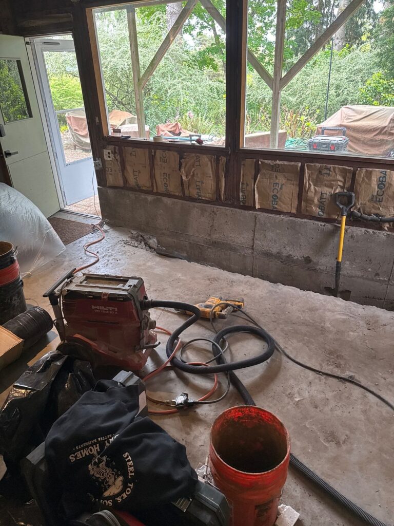 Portland Oregon basement being finished with framing and drywall showing why waterproofing comes first