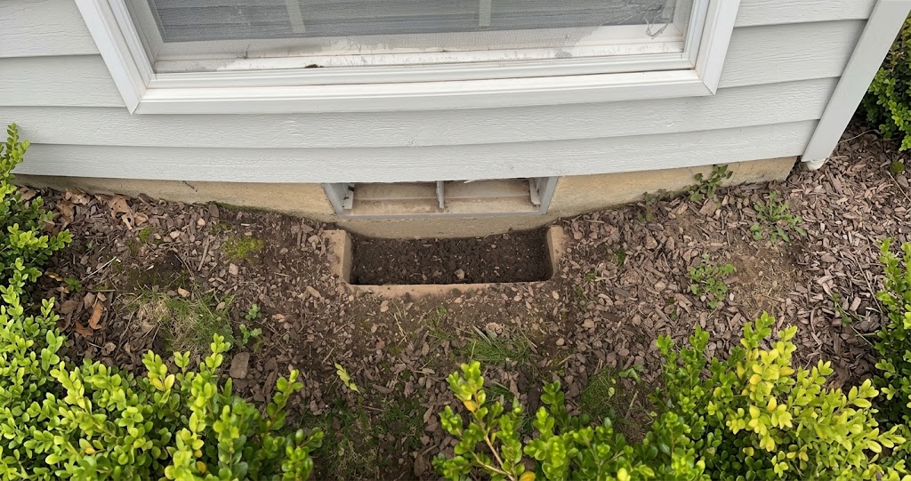 crawl space vents in winter on an Oregon home foundation during the rainy season